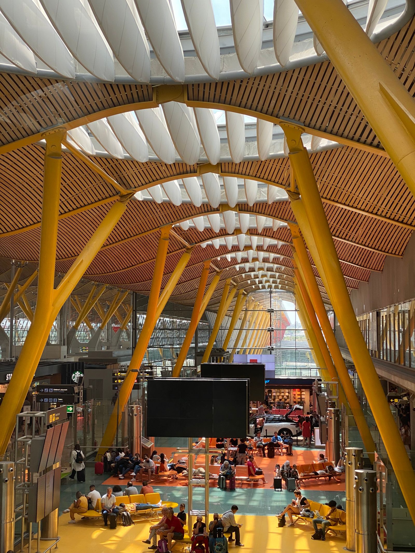 Modern Airport Terminal — Developers · Italy: Rooftop check-in: boarding passes and hotel keys, all on the phone.