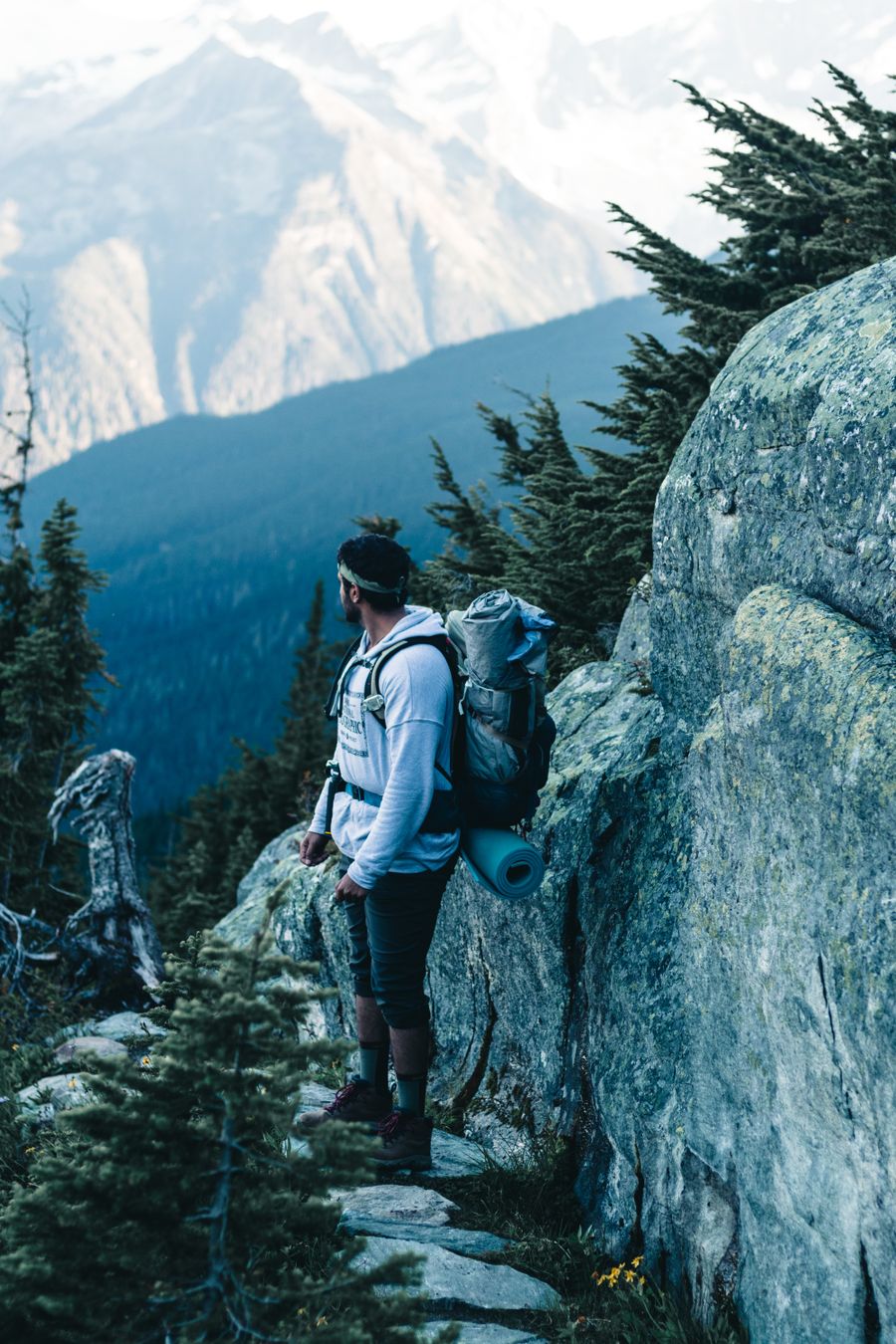 a man standing on the mountain