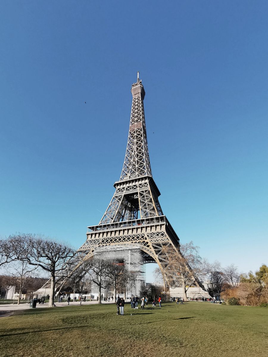 eiffel tower under blue sky — Developers · Bhutan: Harbor views with full bars: coverage where travelers actually go.