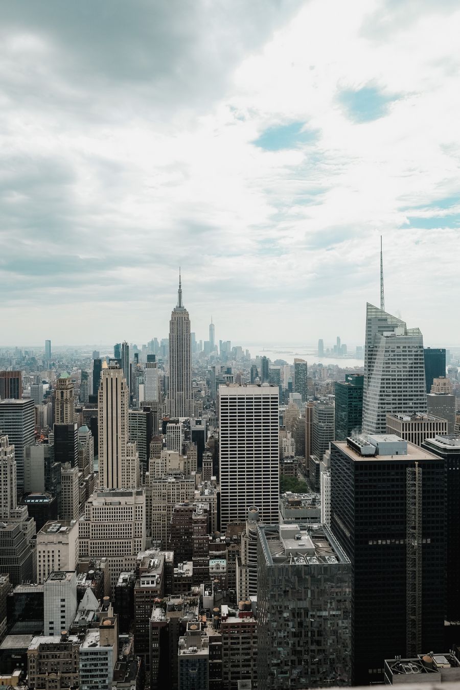 manhattan cityscape with skyscrapers — Developers · Barbados: Sunrise hikes start with a weather check — data on, boots on.