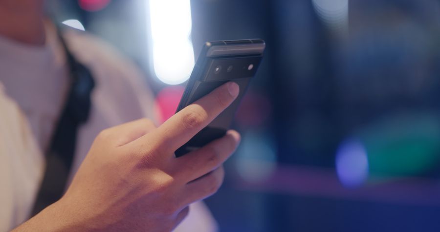 a person holding black smartphone — Developers · Monaco: Street-food stalls and mobile pay: dinner ordered without a word of the language.
