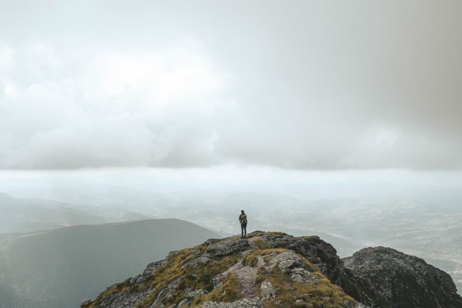 person standing on the mountain