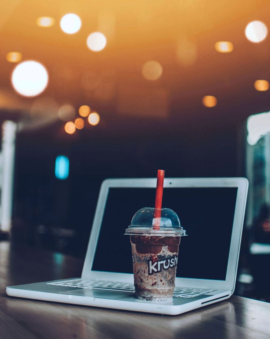 smoothie on top of white laptop computer — Developers · Palestine: Museum afternoons with audio guides streaming, not buffering.