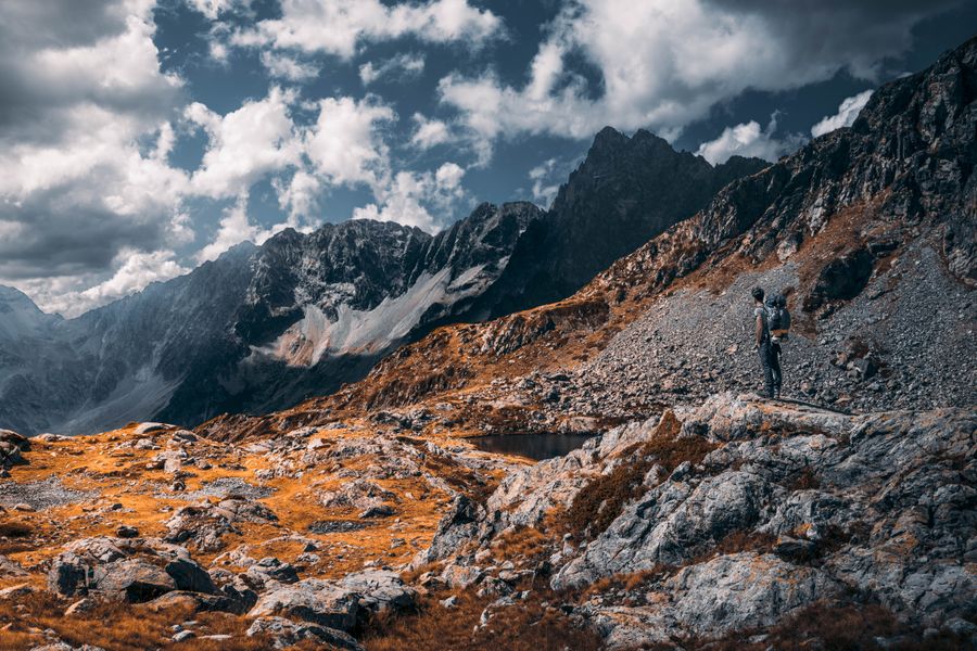 hiker standing on rocky mountain — Developers · Turkey: Rate limits are generous and documented — no surprise 429s.