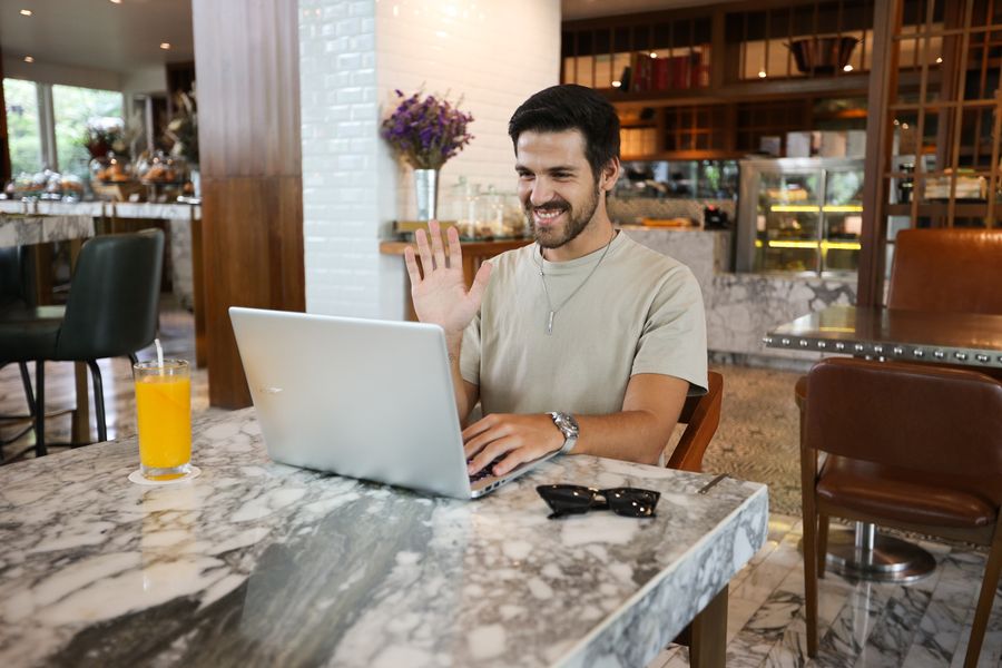 a man using laptop — Developers · Barbados: Family group chat: location shared, dinner plans settled in minutes.