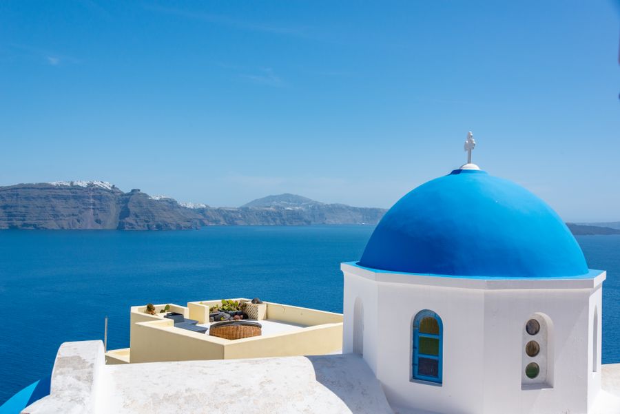 church on santorinin in greece — Developers · Mali: The conference badge: QR ticket scanned, session schedule synced.