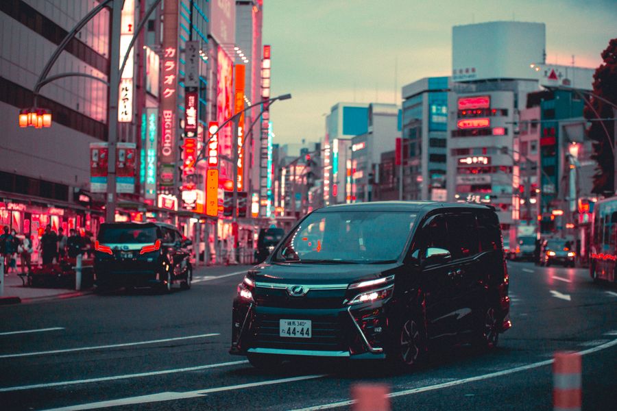 black toyota noah driving down the street in tokyo — Developers · Switzerland: The viewpoint at golden hour: livestream the sunset to everyone back home.
