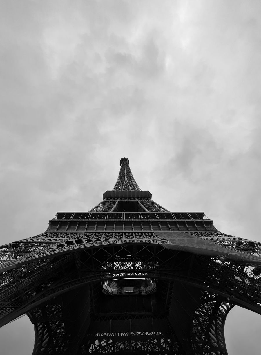 low angle shot of eiffel tower — Developers · Qatar: The night bus: entertainment downloaded, messages queued, rest easy.