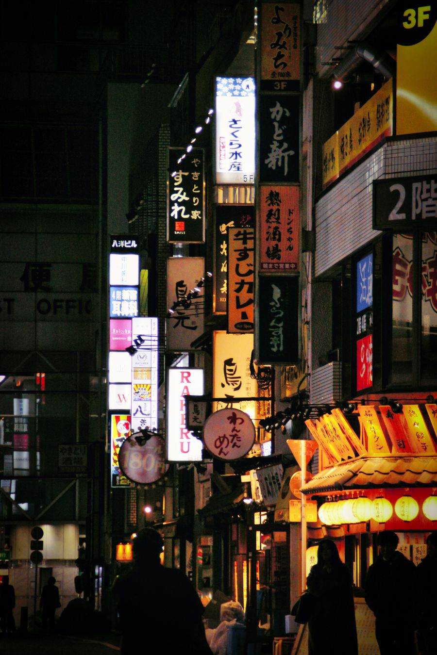 view of illuminated signs on buildings in tokyo at night — Developers · Cuba: SDKs, a CLI, and an MCP server — the developer surface, complete.