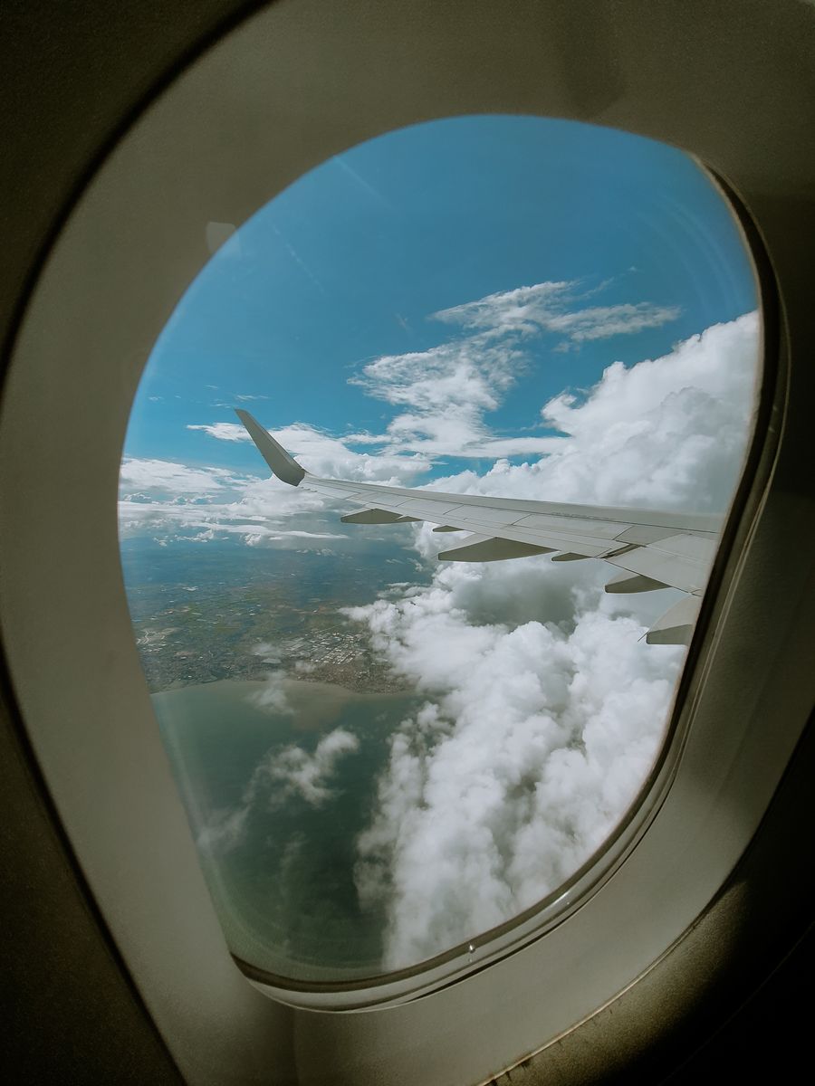 a view of the sky through an airplane window