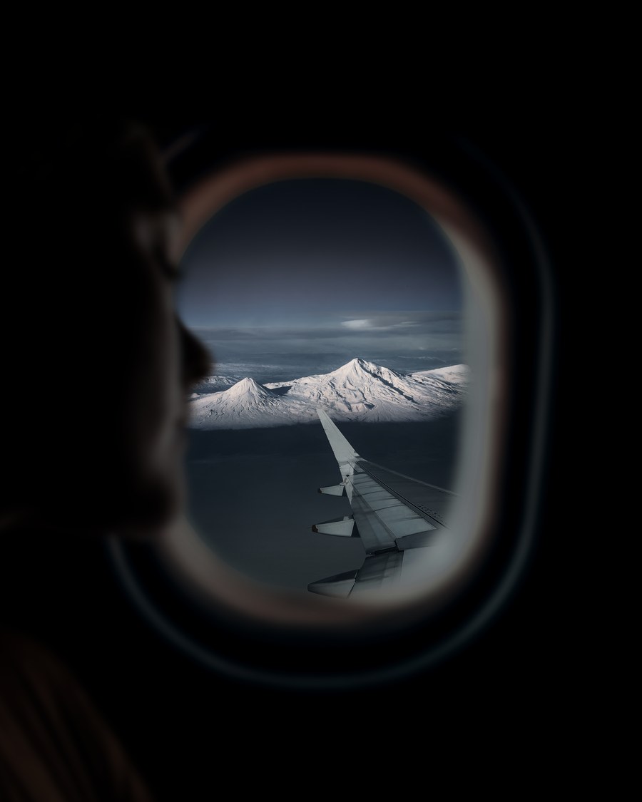 snowy mountains view from airplane window — Support: The fix for most issues: toggle airplane mode, check the eSIM line.