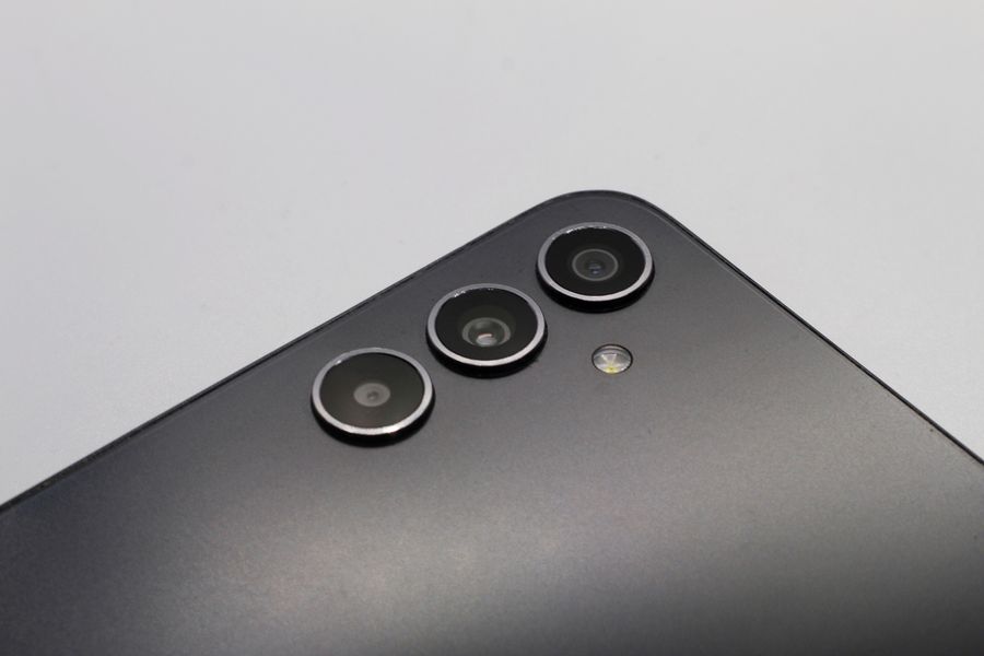 modern smartphone triple camera close up shot — Developers · Estonia: The modern arrival: online before the seatbelt sign goes off.