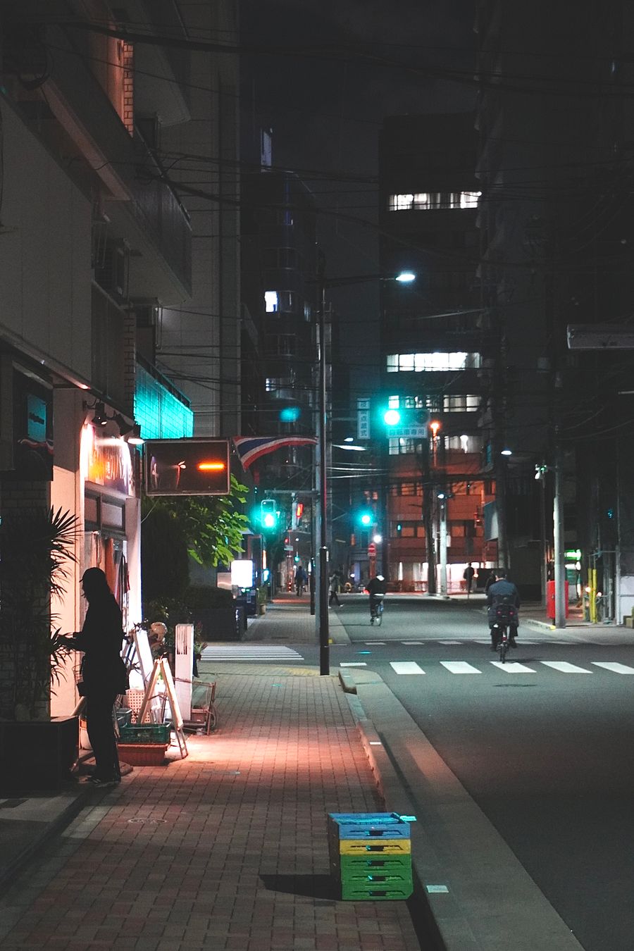 quiet tokyo night street scene with people — Developers · Cuba: Rain or shine, the connection holds — weather doesn't throttle data.