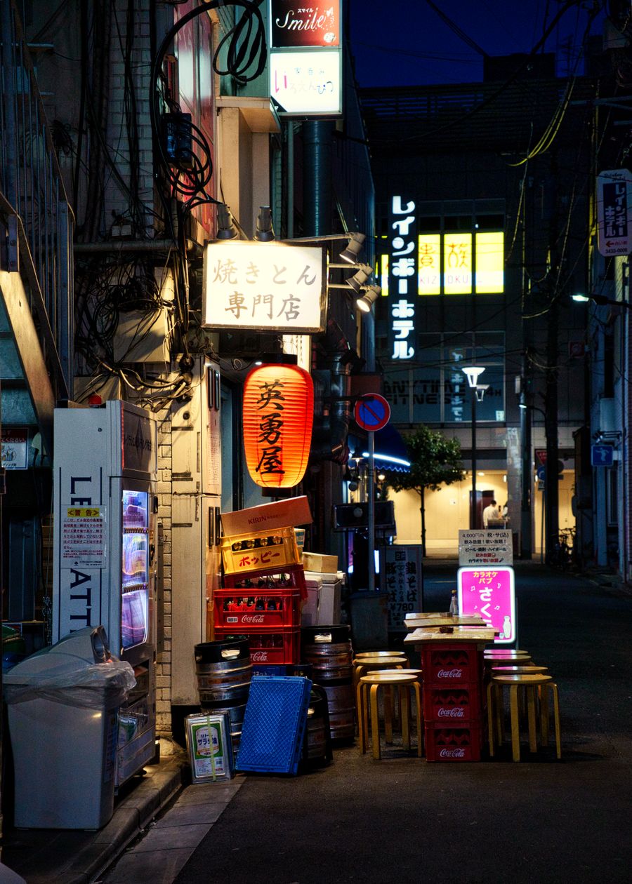 vibrant tokyo alley at night