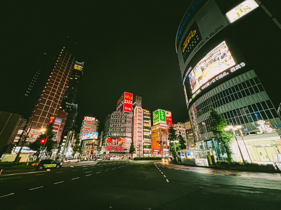 vibrant nightlife in shinjuku tokyo — Developers · Latvia: The conference badge: QR ticket scanned, session schedule synced.