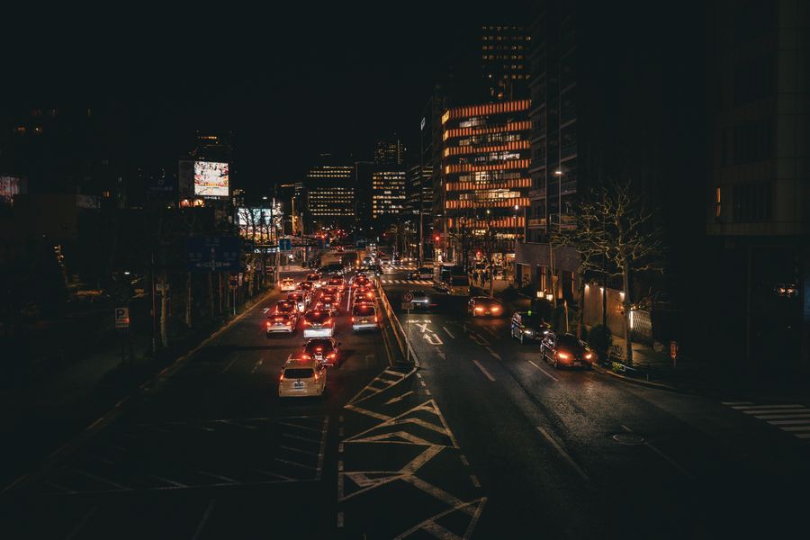 nighttime cityscape of tokyo streets — Developers · Cameroon: Street-food stalls and mobile pay: dinner ordered without a word of the language.