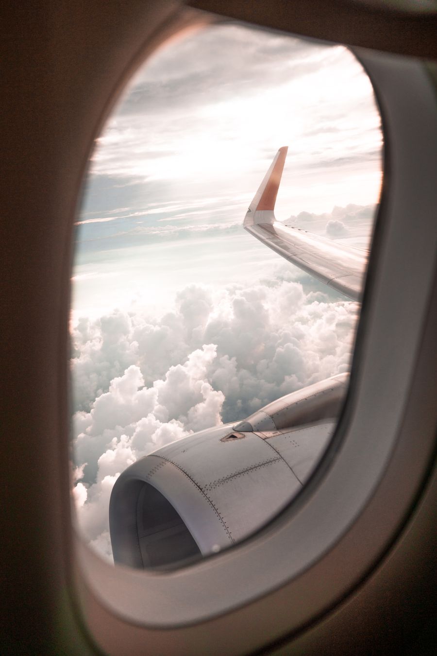 selective focus photo of airplane window — Developers · Somalia: Webhooks tell you when data runs low, plans expire, top-ups land.