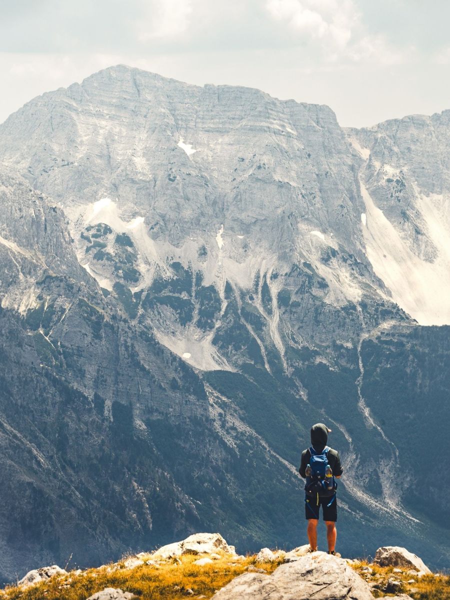 hiker admiring majestic albanian mountains — Developers · Belgium: The docs ship with runnable examples, not pseudocode.