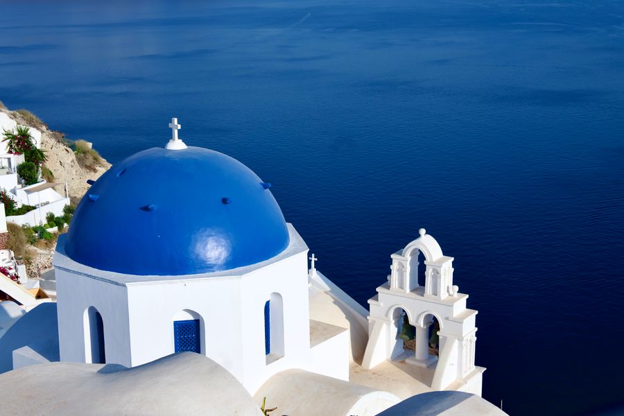scenic view of santorini s iconic blue domes — Developers · Iceland: Downtown, connected: the eSIM finds the fastest local network on its own.