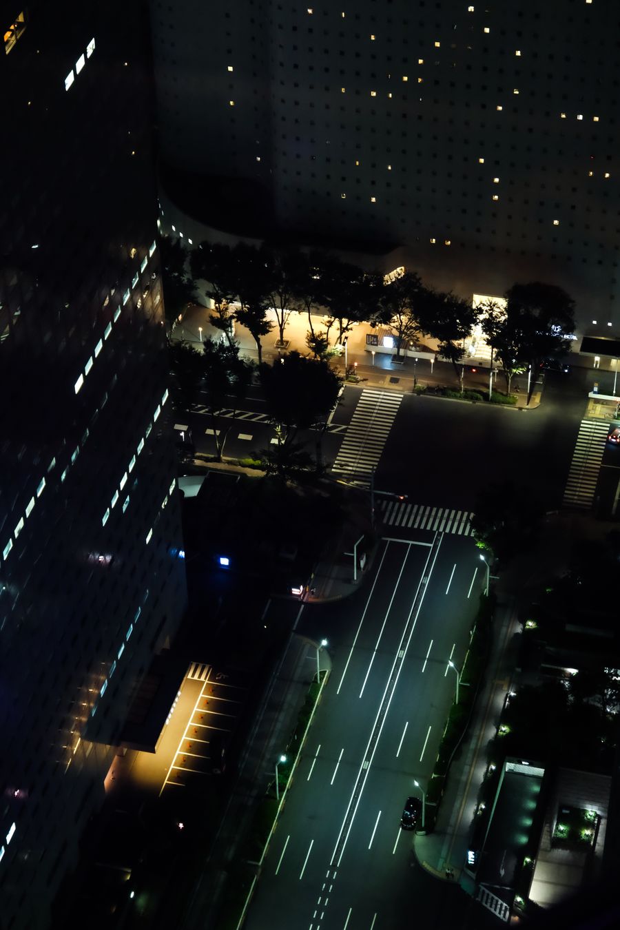tokyo night aerial view of illuminated streets — Developers · Timor-Leste: Street-food stalls and mobile pay: dinner ordered without a word of the language.