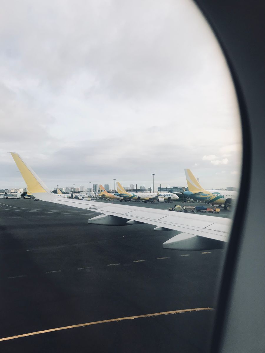 view of airplanes parked at manila airport