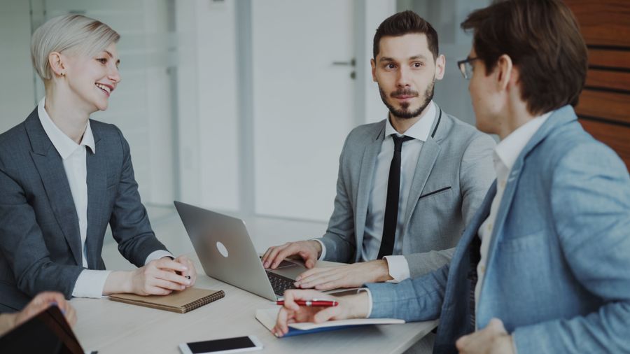 professional business meeting in modern office — Developers · Liechtenstein: Street-food stalls and mobile pay: dinner ordered without a word of the language.