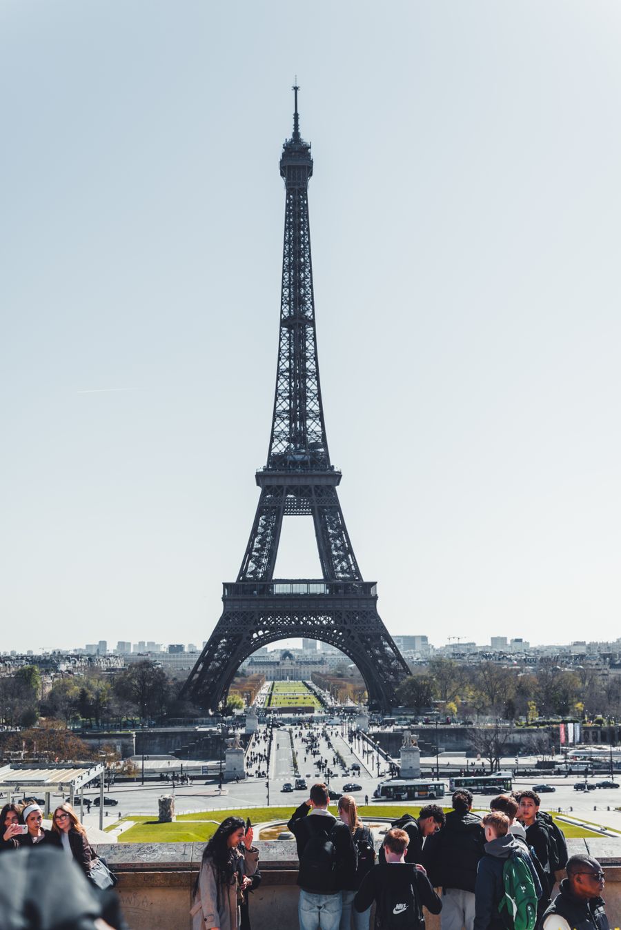 tourists at the eiffel tower in paris daytime view — Developers · Denmark: The modern arrival: online before the seatbelt sign goes off.