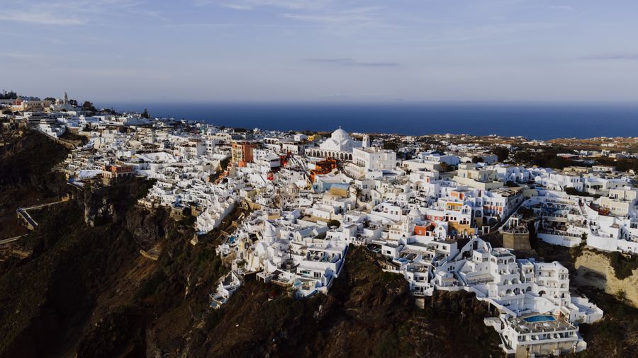 aerial view of fira santorini s white structures — Developers · Saint Lucia: From departure lounge to arrival hall, the data never drops.