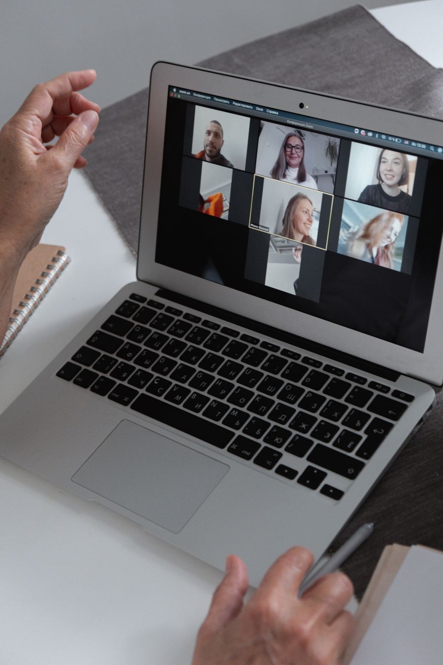 a group of people chatting in a video call in a laptop — Developers · DR Congo: Rain or shine, the connection holds — weather doesn't throttle data.