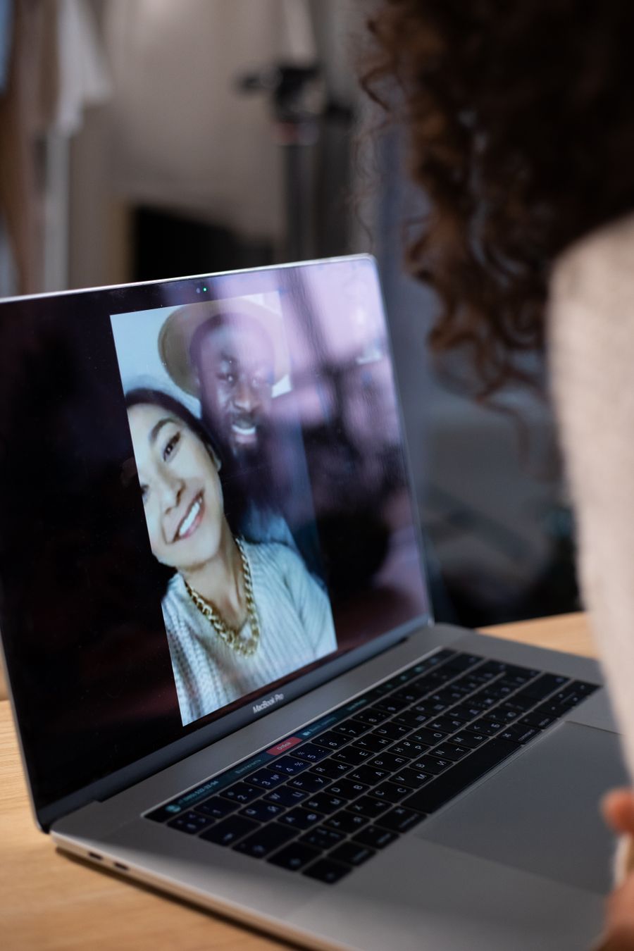 crop woman making video call on laptop — Docs: Translated into six languages by humans who travel.