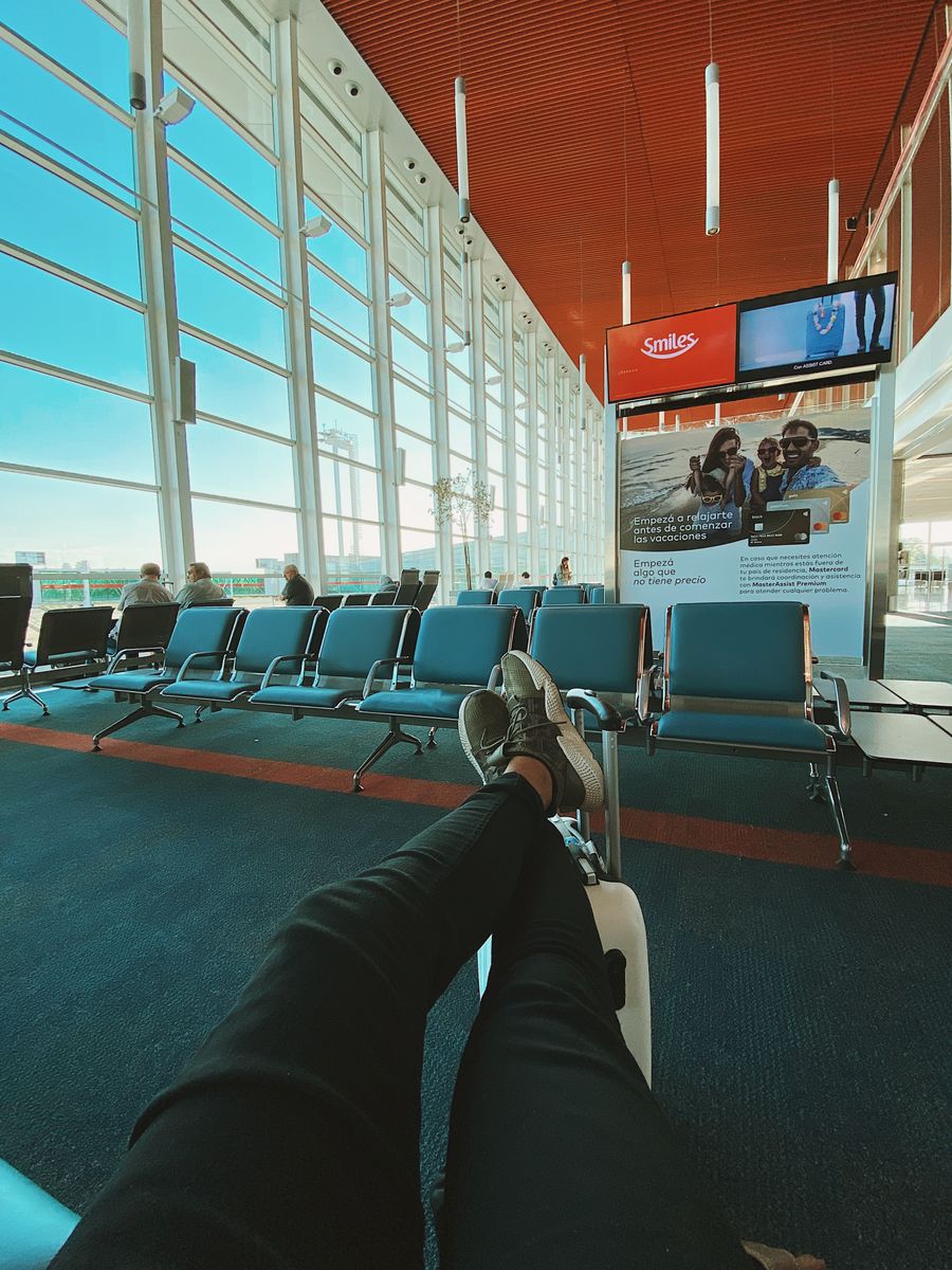 man waiting for flight in airport — Developers · Estonia: From departure lounge to arrival hall, the data never drops.