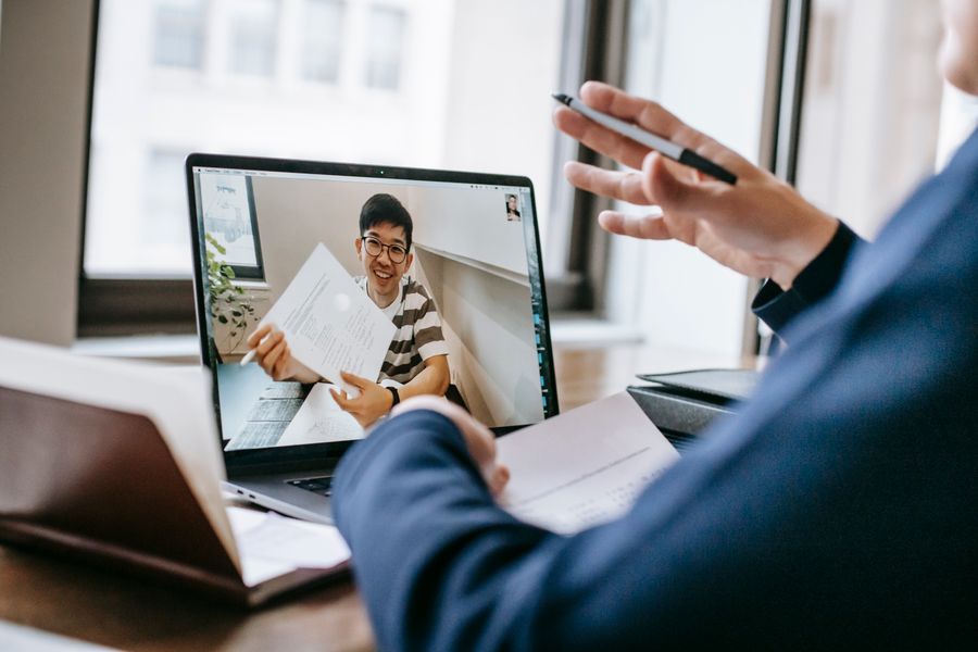 photo of people having video conference — Developers · Thailand: The modern arrival: online before the seatbelt sign goes off.