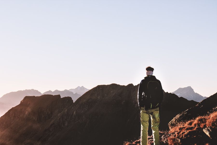 person standing on top of the mountain — Developers · Mali: Trailheads and lookouts: offline maps downloaded, just in case.