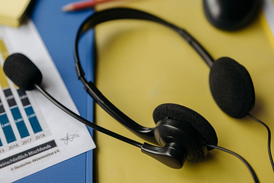 black headset on yellow file — Developers · Denmark: Island time, online time: ferries, beaches and full signal.