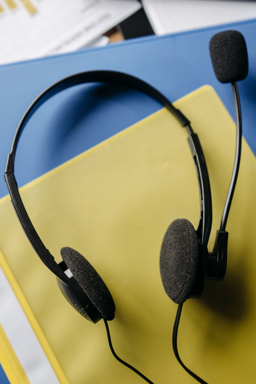 black corded headphones on yellow surface — Developers · Burkina Faso: The status page is public — uptime you can verify, not claim.