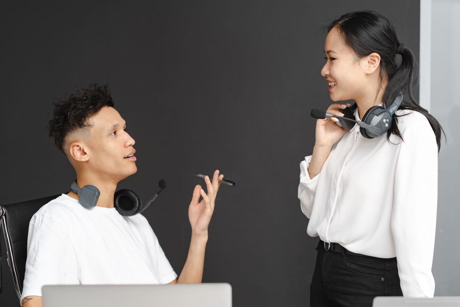 man and woman in white clothes wearing headset — Developers · Burkina Faso: SDKs, a CLI, and an MCP server — the developer surface, complete.
