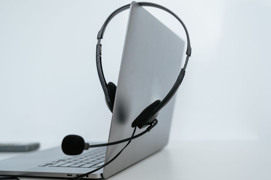 a headset on a laptop — Developers · Libya: The long layover: streaming, working and messaging, all covered.