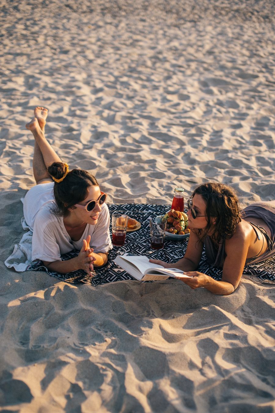 a women having a picnic together — Developers · Norway: The viewpoint at golden hour: livestream the sunset to everyone back home.