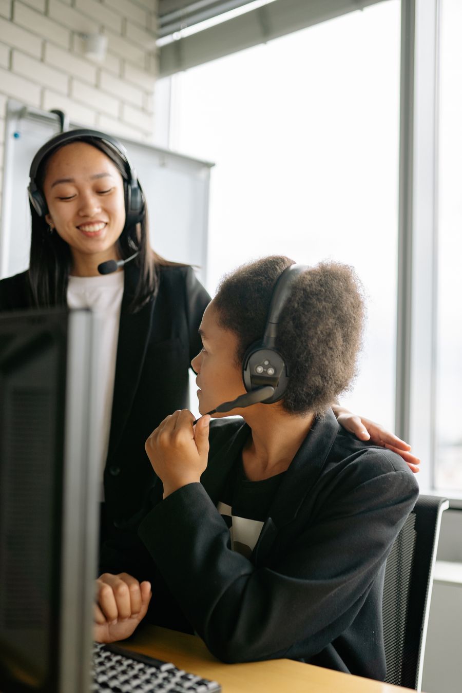 woman in black long sleeve shirt using headphones — Developers · Central African Republic: Golden hour, fully online — photo backups upload before dinner.